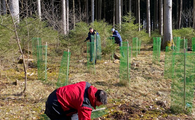 Kocher company takes part in tree planting.